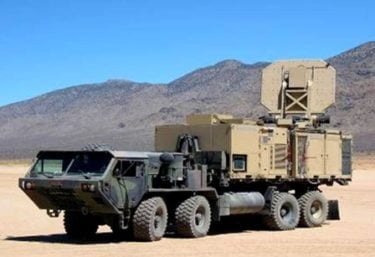 An operational version of the Active Denial System is shown. It is an invisible, counter personnel, directed-energy weapon.

https://commons.wikimedia.org/wiki/File:An_operational_version_of_the_Active_Denial_System.jpg