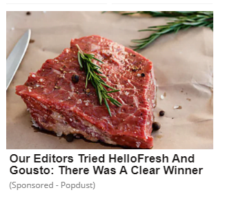 A photo of raw steak on brown paper with a sharp knife beside it and a sprig of thyme on top. The headline reads "Our Editors Tried HelloFresh And Gousto: There Was A Clear Winner" and beneath in small, light grey text "(Sponsored - Popdust)" 
