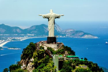 Christ the Redeemer statue in Brazil overlooking the sea.