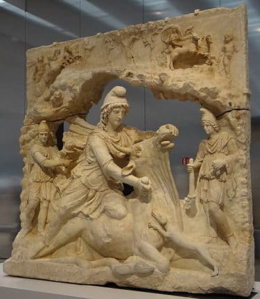 Mithra sacrificing the bill (100-200 BCE), from the Borghése collection bought in 1807 by the Louvre.
https://commons.wikimedia.org/wiki/File:Mithra_sacrifiant_le_Taureau-005.JPG