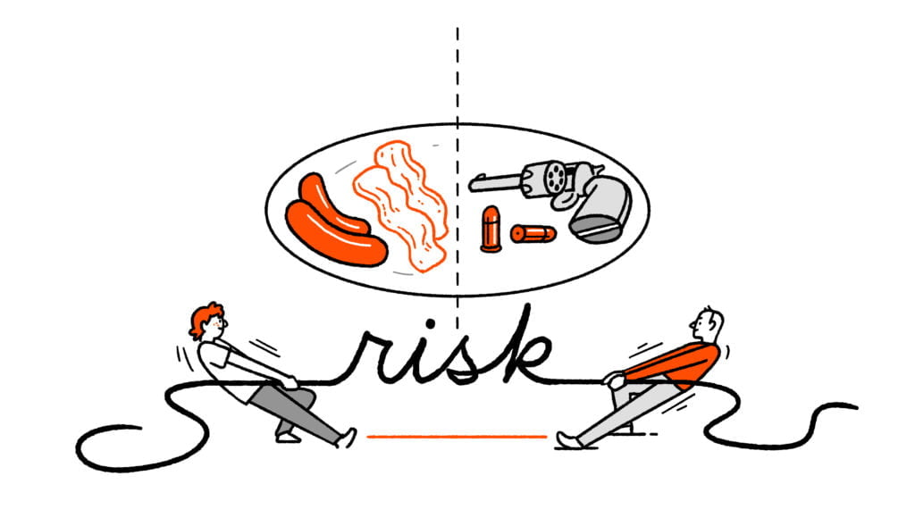 Two characters tug at a piece of rope shaped like the word "risk" - above one is a plate of sausages and bacon, above another a revolver with two bullets beside it. 