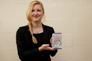 Deputy Editor of the Skeptic Dr Alice Howarth holds one of the Shuzi bands during a product test by the Merseyside Skeptics Society