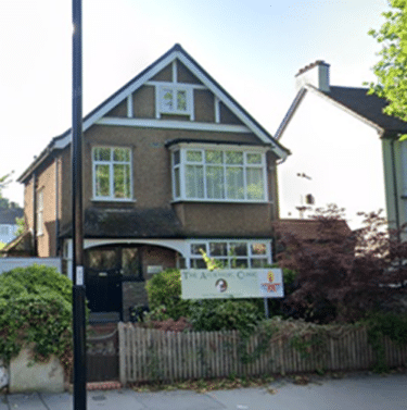 A screenshot of the Google Map Street View of the The Ayurvedic Clinic - the clinic is a detached house with a sign out the front. 