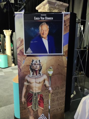 A picture of Erich Von Daniken on another advertising board. 