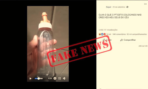 A Facebook picture of a baby bottle with a penis shaped teat and a "FAKE NEWS" stamp across the top. 