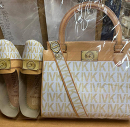 A paper handbag and matching paper shoes