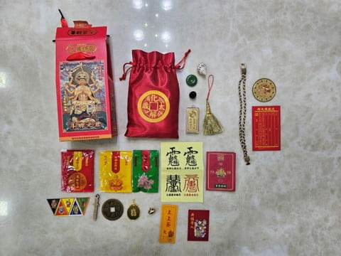 A prayer package, including charms and trinkets to protect you from misfortune