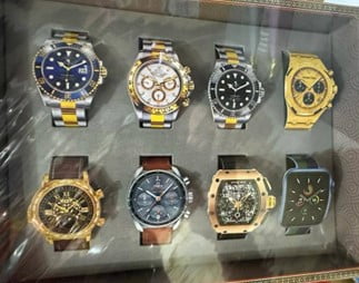Paper watches in a watch case