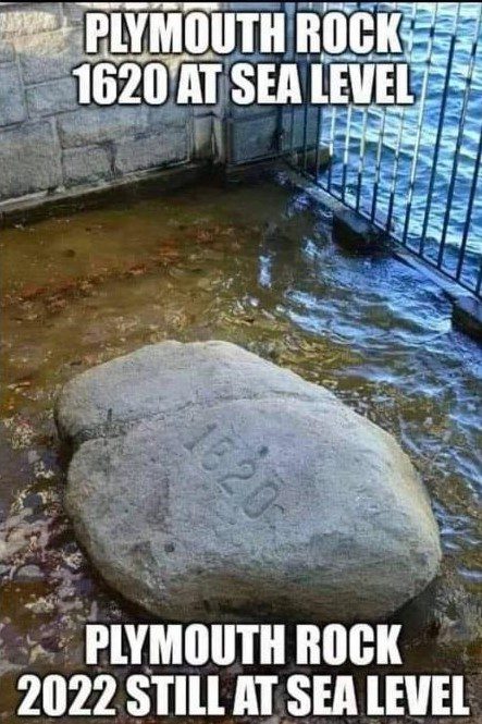 A photo of a rock engraved with "1620" surrounded by water. The text reads "Plymouth rock 1620 at sea level. Plymouth rock 2022 still at sea level"