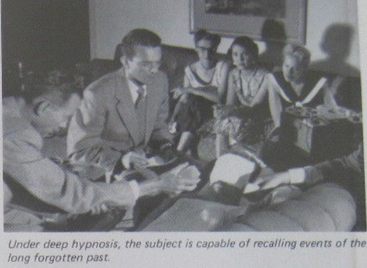 By Morey Bernstein - Pictures from the LP The Search for Bridey Murphy. Experiment No. 1 Research Recordings No. 101. Released with the book The Search for Bridey Murphy. Doubleday, 1956., Public Domain, https://commons.wikimedia.org/w/index.php?curid=57719095

Photo shows a woman laying on a sofa surrounded by people watching on. 