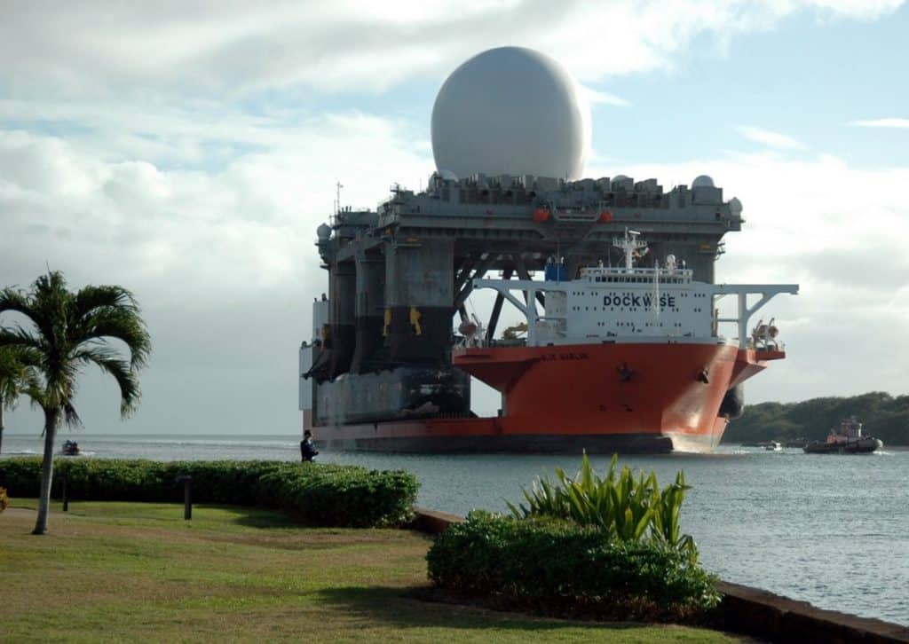 A photo of a sea-based X-band Radar
platform entering Pearl Harbor on the MV Blue Marlin. It is a large white dome on the back of a very large ship. The dome is often misattributed to the HAARP project.