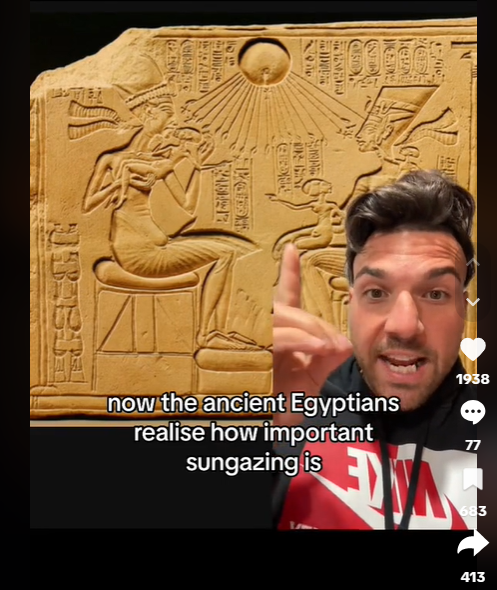 Screenshot of a TikToker speaking in front of a green screened image of Egyptian carvings. The caption reads "now the ancient Egyptians realise how important sun gazing is"