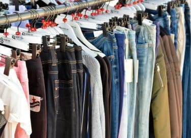Clothing hanging on a rail
Photo by Waldemar on Unsplash