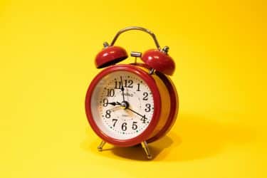 A red alarm clock on a yellow background
Photo by mostafa mahmoudi on Unsplash