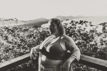 A woman leaning against a ledge in thought
Photo by Rachel Salles on Unsplash