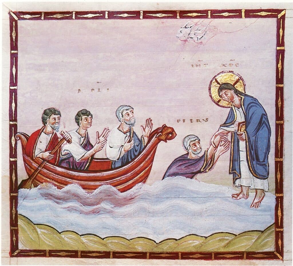 A painted illustration from a medieval book. A boat and some people are at sea.
At left, three men are seated in a boat and are facing right. To the right of them a fourth man, also facing right, is submerged to his waist in the water. On the right hand side of the frame a fifth figure is standing on the surface of the water, facing left, and is reaching down to hold the hands of the  submerged man. A large gold halo surrounds the head of the standing man.