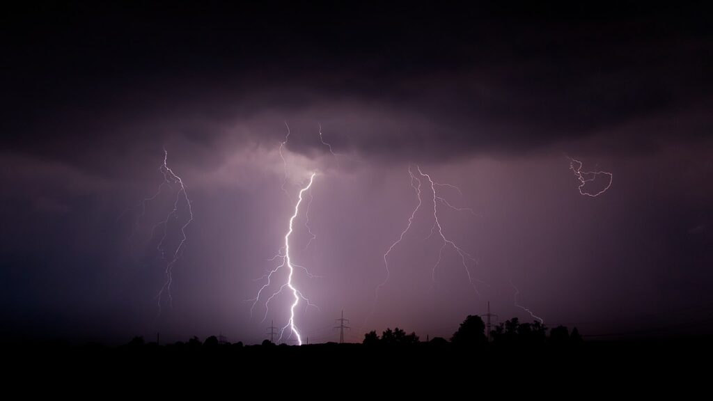 Flashes of lightning from a cloud at night