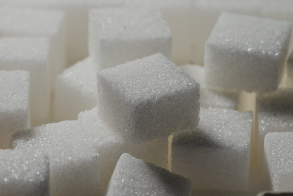 A photograph of sugar cubes laying on top of one another