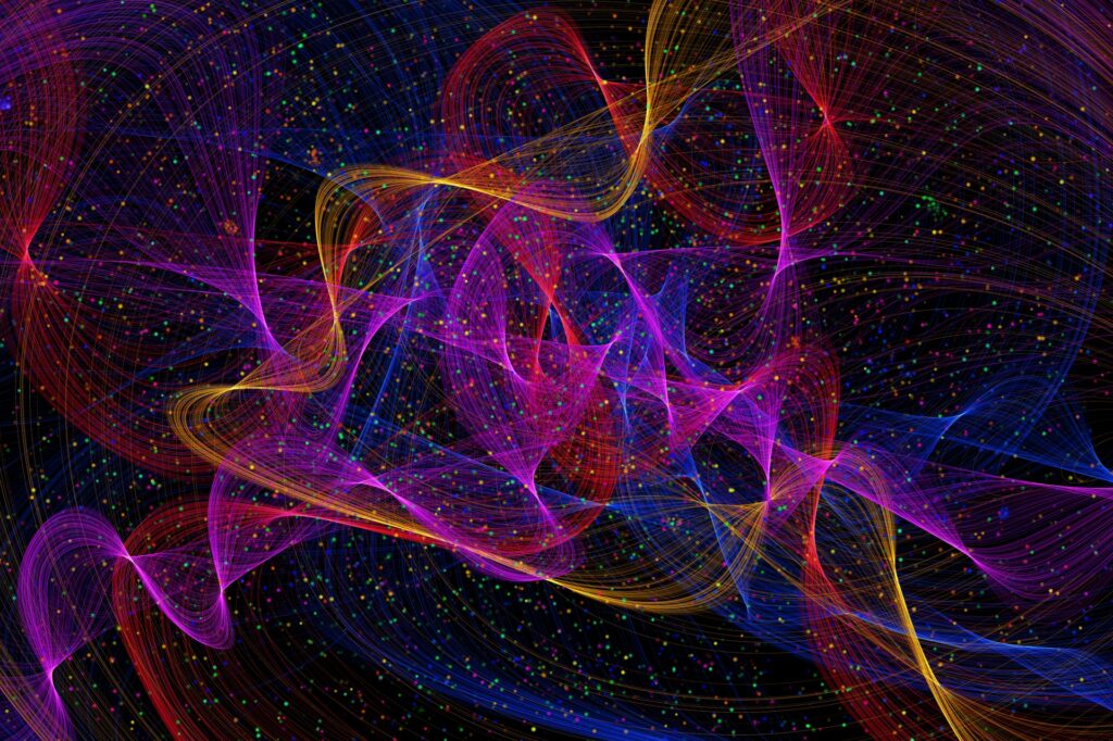 Concept art depicting wavy light lines against a black background in yellow, magenta, red, blue and green, with small dots of various colours across the image